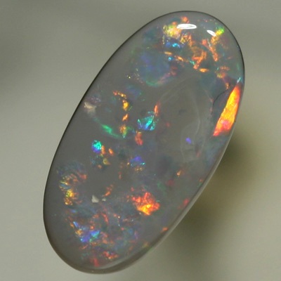 SOLID SEMI BLACK OPAL Sparkling bright red and orange with green and blue in between